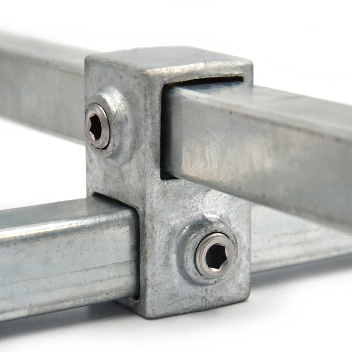 Rohrverbinder aus Stahl Vierkant Kreuzstück, vorgesetzt 90° ▇ 25x25 mm